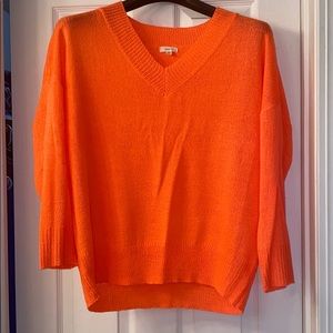 Neon orange sweater